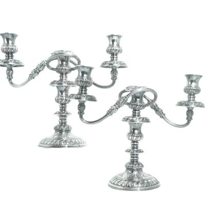 A pair of ornate antique English silver-plated convertible candelabras with 2 arms and centre candle for a total of 3 lights on each c....