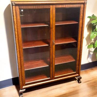Antique American Walnut 2 Door Glass Front Bookshelf / Display Cabinet. 4 Shelves. Measures 41" long, 14" deep and 57"...