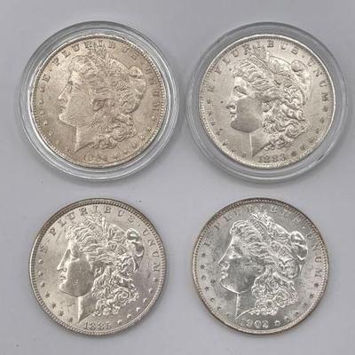 #332 • (4) 1883-1902 Morgan Silver Dollars
