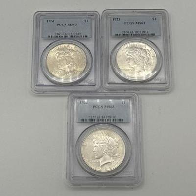 #446 • (3) 1922-1924 Silver Peace Dollars
