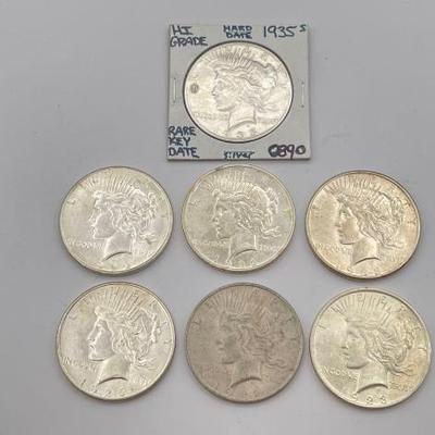 #470 • (7) 1922-1935 Silver Peace Dollars
