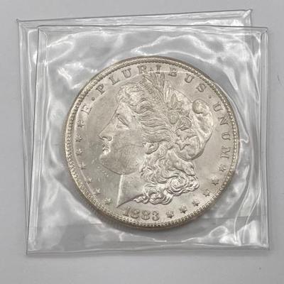 #308 • 1883-CC Morgan Silver Dollar

