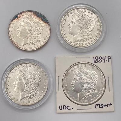 #388 • (4) 1884-1900 Morgan Silver Dollars
