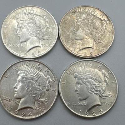 #520 • (4) 1923-1925 Silver Peace Dollars
