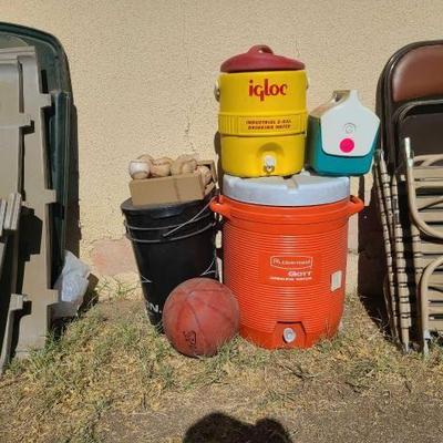 #6022 • (2) Drinking Water Coolers, Igloo Lunchbox, Bucket of Baseballs, and Basketball
