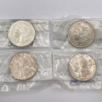 #426 • (4) 1921 Morgan Silver Dollars
