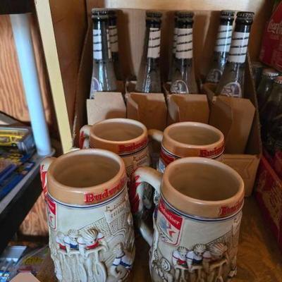 #5048 • 4 Budweiser Olympic Steins , 8coors Light Bat Bottles

