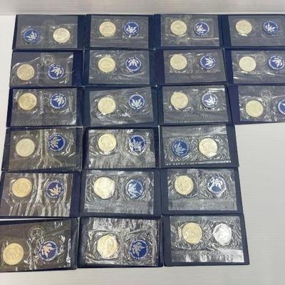#774 • (21) 1971-1974 Eisenhower Uncirculated 40% Silver Dollars
