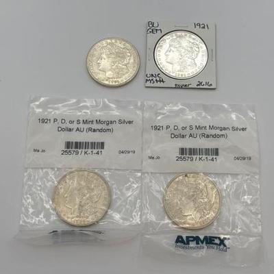 #430 • (4) 1921 Morgan Silver Dollars
