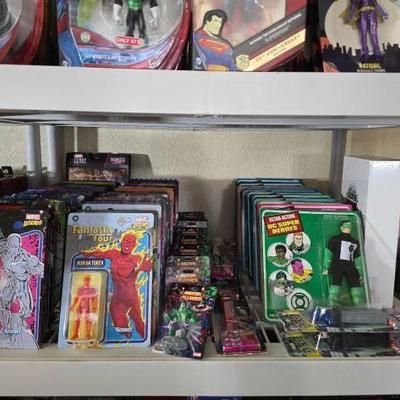 #2166 • 71 Marvel and DC Comics Action Figures and Pez Dispenser
