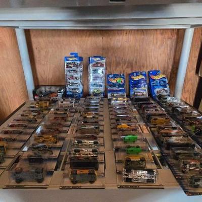 #5032 • 85 Hot wheels In Packages
