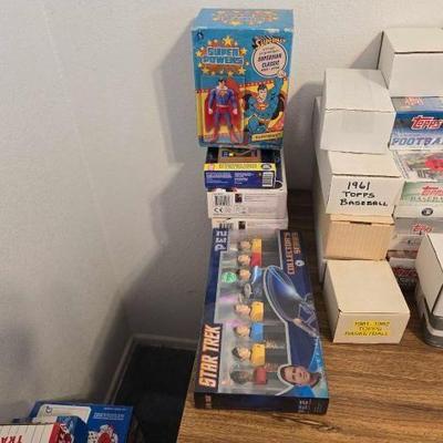 #2969 • (2) Arcade Classics Games, (1) Electric Baseball Game, (1) Superman Action Figure, and (1) Star Trek Pez Dispenser Set
