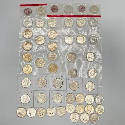 #750 • (50) 40% Silver Kennedy Half Dollars
