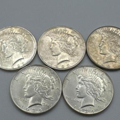 #486 • (5) 1922-1934 Silver Peace Dollars
