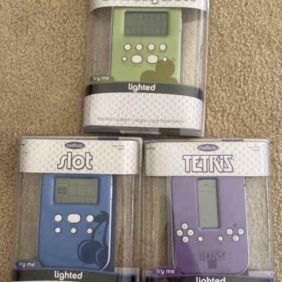 HKC032 Lot of Three Brand New Radica Handheld Games - Poker, Blackjack & Tetris