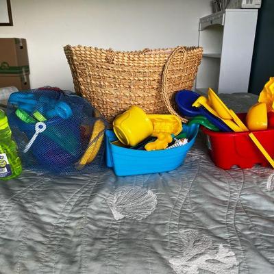 KKF057- Assortment Of Beach Toys W/ Woven Basket