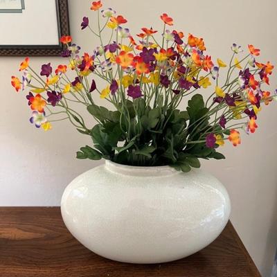 White vase with flowers