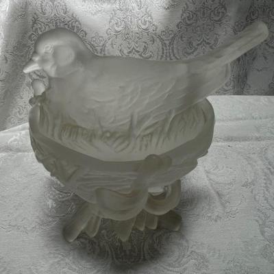 Camphor glass hen on nest