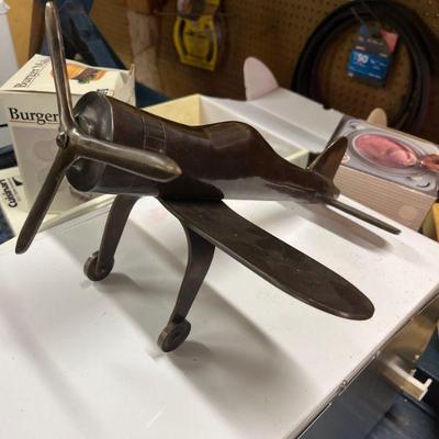 brass airplane