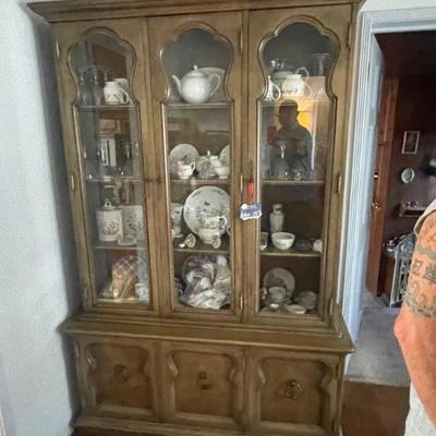 VINTAGE CHINA HUTCH FILLED WITH ENGLISH BONE CHINA.
