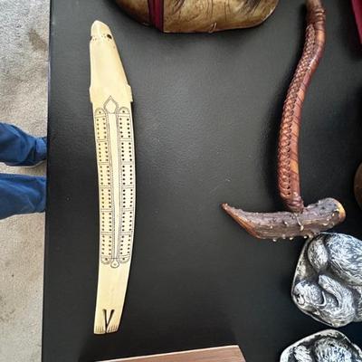 Eskimo carved cribbage board 