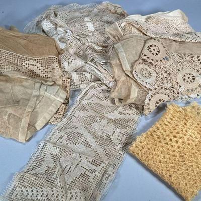 COLLECTION LACE & TEXTILES | Antique and vintage lace doilies and fabrics, including fabric folio with applied portrait and bow...