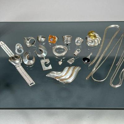 STERLING & OTHER JEWELRY | Several sterling silver pieces, each stamped, including: two flat woven necklaces, three rings, two...