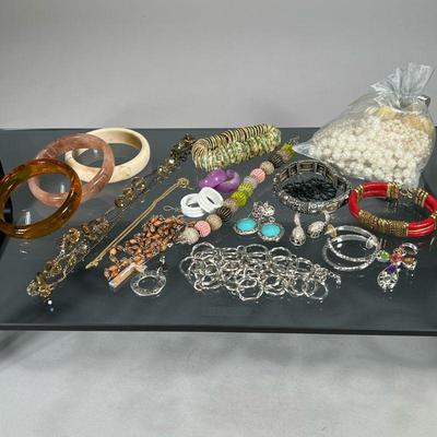 GROUP COSTUME JEWELRY | Necklaces, bracelets, earrings, and more, including a set of 3 bangles, faux pearls, a gold filled chain, etc.

