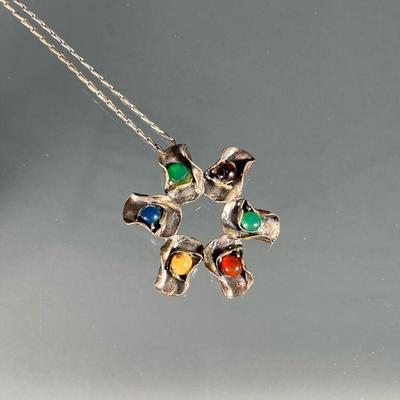 MCM STERLING SILVER ART PENDANT NECKLACE | Marked “925” and mounting six semi-precious stones on a (possibly) silver chain. 0.7 ozt -...
