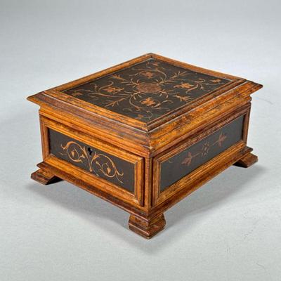 SCROLL INLAID ANTIQUE JEWELRY BOX | The interior with a hinged mirror and fitted with blue tufted satin fabric; lock functions with key....