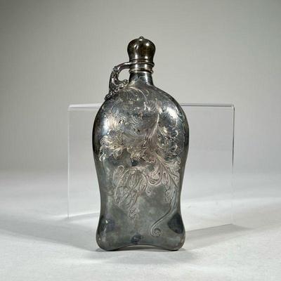 ENGRAVED SILVER OR SILVERPLATE FLASK | Shaped flask with scrolling acanthus decoration, monogrammed, though marked "sterling"...