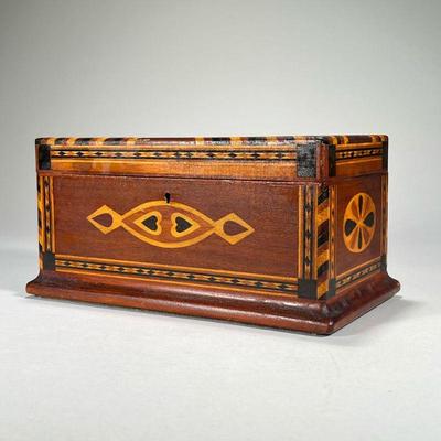 FOLK ART INLAID JEWELRY BOX, PROBABLY NEW ENGLAND | Of exceptional quality with folk art motifs inlaid in contrasting woods; banded...