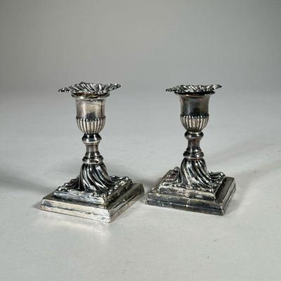 PAIR ENGLISH STERLING CANDLESTICKS | Two candle stick holders with detachable bobeches each having English hallmarks, weighted bottoms;...