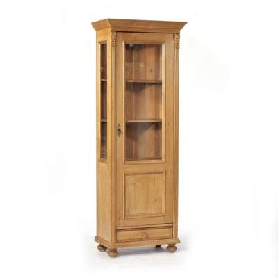 CARVED PINE DISPLAY CABINET | A beautiful form and color, light wood with a glazed door, square columns with carved capitals, and...