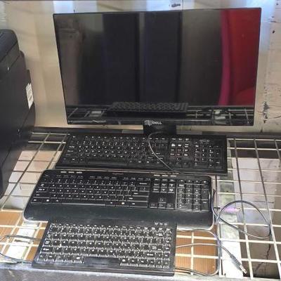 #4010 • Dell 23.5" Monitor and (3) Keyboards
