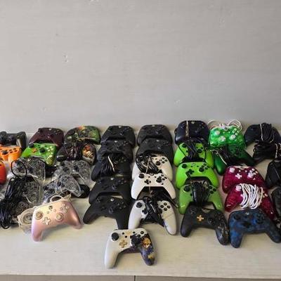 #8596 • (41) Xbox and PlayStation Wired Controllers
