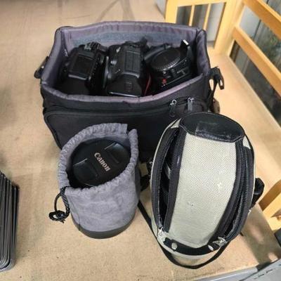 #2844 • (3) Canon Cameras, (2) Zoom Lenses & Carrying Case
