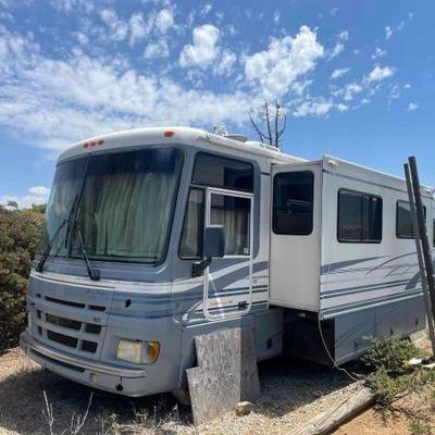 #100 • 1999 Ford F53 RV
