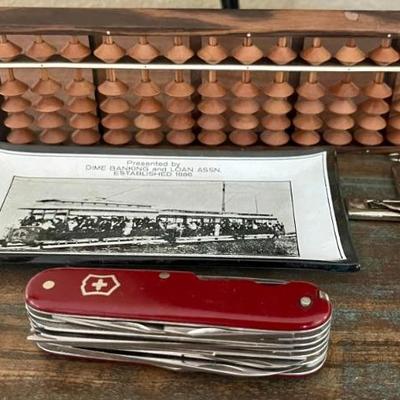 Swiss Army Knife - Inari Crucifix - Vintage Abacus - Duxelle Brass Boy Figurine & Dime Banking  & Loan Tray 