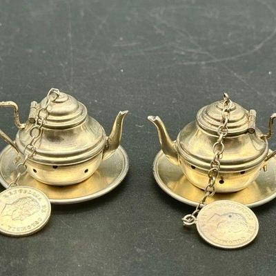 (2) Coin Silver Stamped “0900” Tea Strainers
