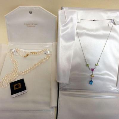 1252	2 NECKLACES, 1 PEARL NECKLACE AND NECLACE WITH COLORED STONES CLASP MARKED 585
