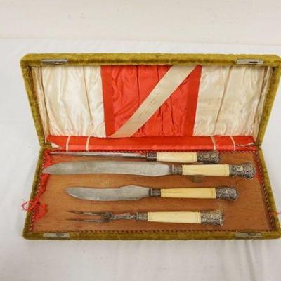 1112	ANTIQUE 4 PIECE CARVING SET, LARGEST PIECE APPROXIMATELY 16 IN
