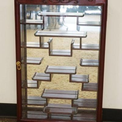 1209	ASIAN STYLE MAHOGANY HANGING CURIO CABINET WITH MIRROR BACK, APPROXIMATELY 20 IN X 32 IN
