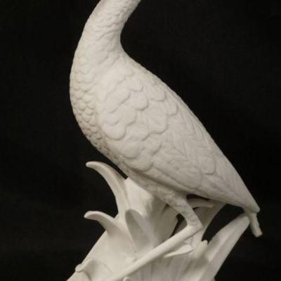 1017	BISQUE FIGURE OF A STORK, APPROXIMATELY 11 1/2 IN HIGH
