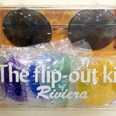 1169	RIVIERA SUN GLASSES *THE FLIP OUT KIT* WITH DIFFERENT INTERCHANGABLE COLORED LENSES
