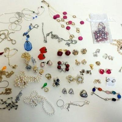 1241	GROUP OF ASSORTED COSTUME JEWELRY INCLUDING NECKLACES, EARRINGS, PINS, ETC.
