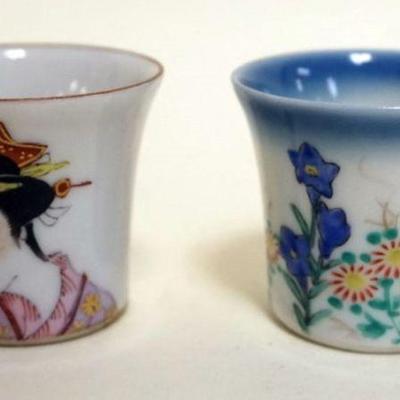 1136	2 SAKE CUPS W/LITHOPHANE BOTTOMS, EACH APPROXIMATELY 2 IN HIGH
