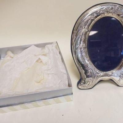 1090	STERLING DRESSER FRAME, APPROXIMATELY 8 IN X 11 IN
