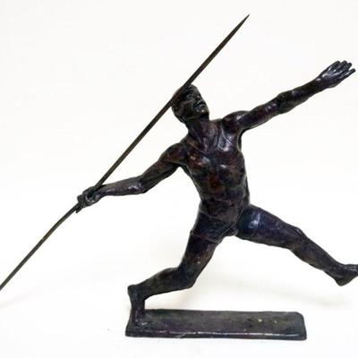 1063	CAST BRONZE IMAGE OF MAN THROWING JAVELIN, APPROXIMATELY 2 IN X 18 IN X 9 1/2 IN HIGH, SIGNED KELSEY
