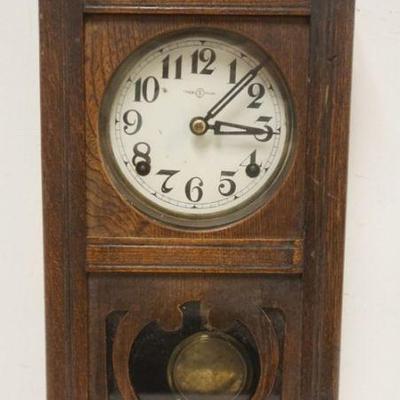 1121	SMALL GERMAN WALL OAK CLOCK, APPROXIMATELY 9 IN X 5 IN X 19 IN HIGH
